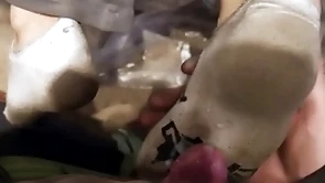 A handful of young guys dirty socks footjob