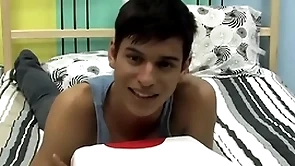 Cute twink is playing with his cock during an interview