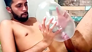 Fucking an inflated condom until i cum inside of it. i fuck it so deep it explodes. wonder how would it feel inside your ass