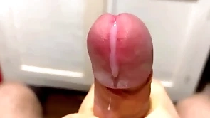 Cumming in close-up with a massive portion of cum in slow motion / big uncut veiny cock / pissing