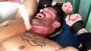 Husky hunk endures bondage and afflict on half naked body