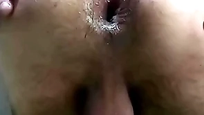 Mulatto fucks himself in the ass together with farts a lot. close shooting